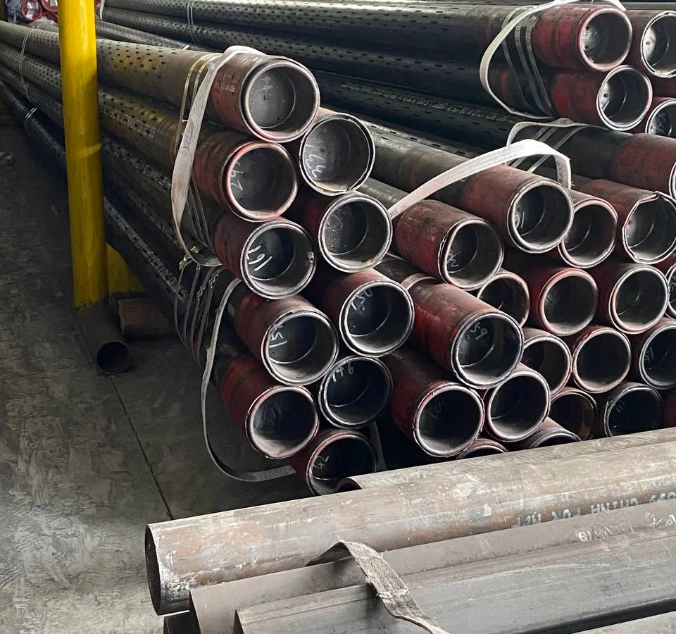 Carbon steel pipe bundles and pipe ends staged in a warehouse